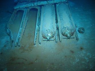Quadruple torpedo tube mount on seabed - two weapons loaded
